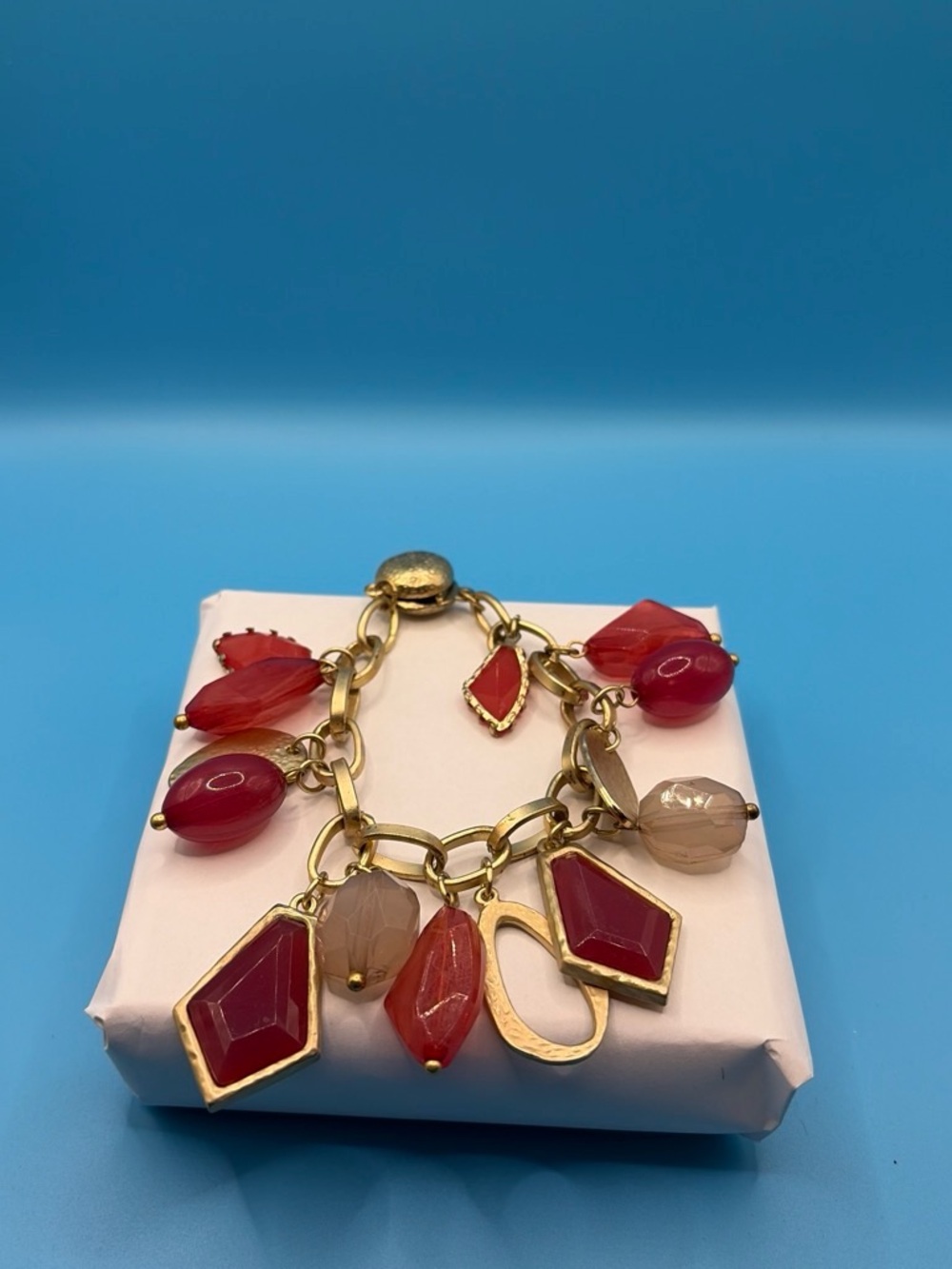 Chico's Gold-Tone Charm Bracelet with Red and Cream Stones